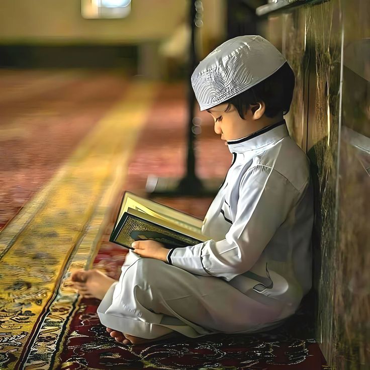 Young Muslim child reading Quran at Noor Al-Rahman Academy - Online Quran memorization for kids